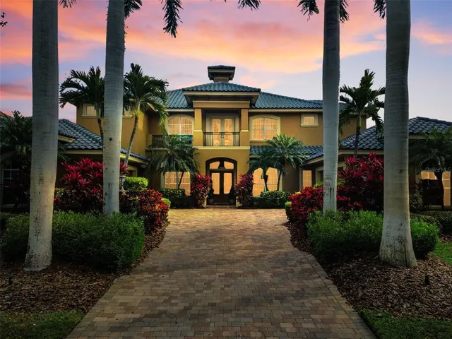 an aerial view of a house with a garden