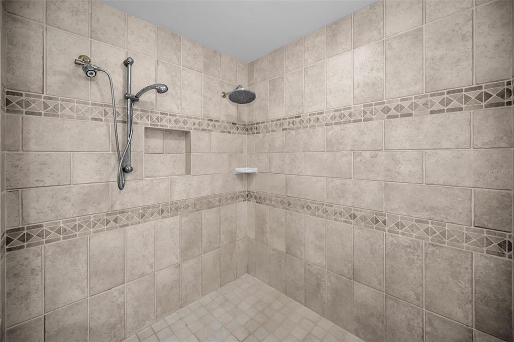8871 Silverthorn Road Seminole, FL 33777 - Photo 64 of 98 a bathroom with a shower