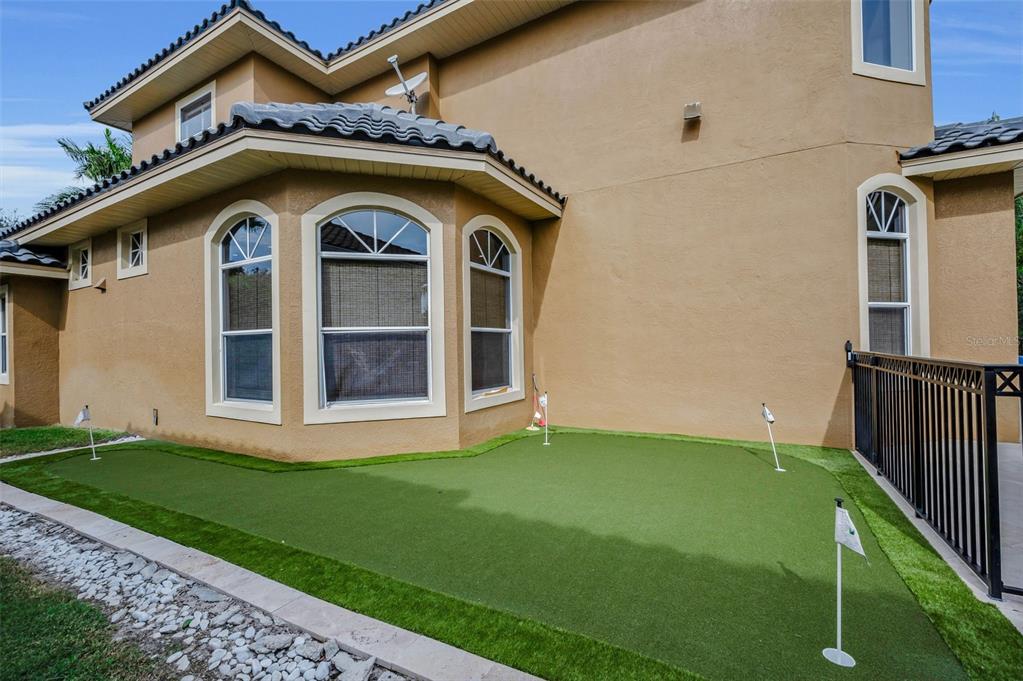 8871 Silverthorn Road Seminole, FL 33777 - Photo 87 of 98 a front view of a house with a yard