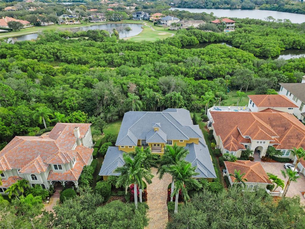 8871 Silverthorn Road Seminole, FL 33777 - Photo 90 of 98 an aerial view of a house with garden space and street view