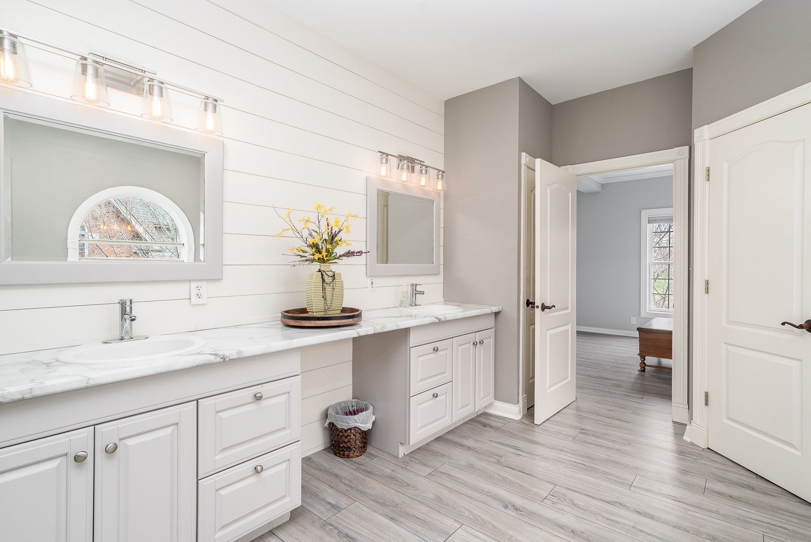 Undisclosed Address Geneva, IL 60134 - Photo 16 of 29 a spacious bathroom with a double vanity sink and a mirror