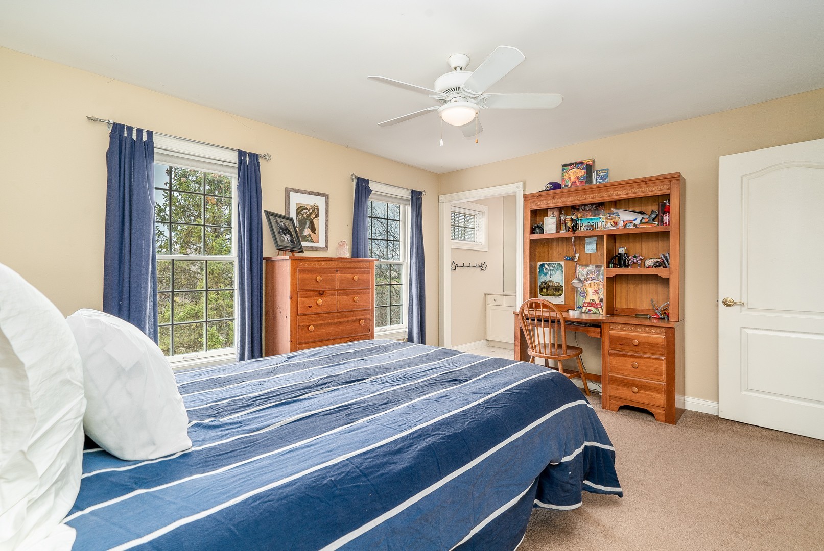 Undisclosed Address Geneva, IL 60134 - Photo 22 of 29 a bedroom with a bed cabinets and window