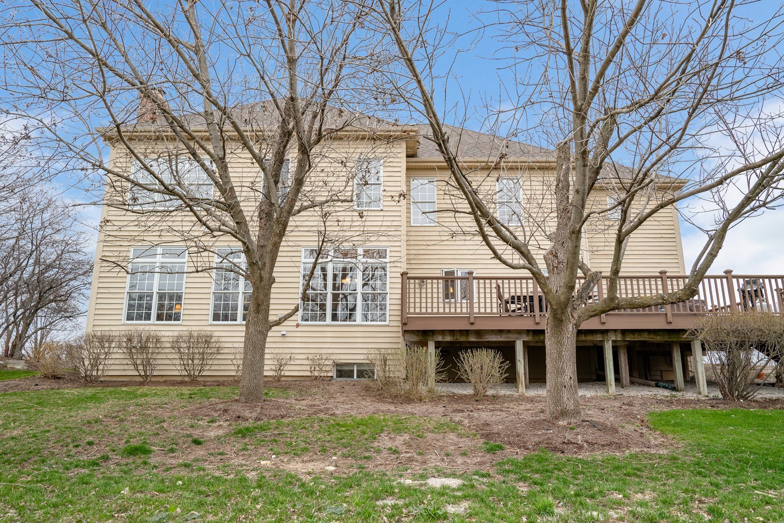 Undisclosed Address Geneva, IL 60134 - Photo 28 of 29 a front view of a house with a garden