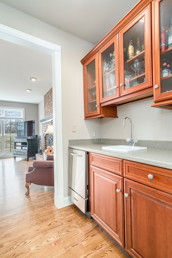 Undisclosed Address Geneva, IL 60134 - Photo 5 of 29 a view of living room with stainless steel appliances granite countertop furniture and a kitchen view