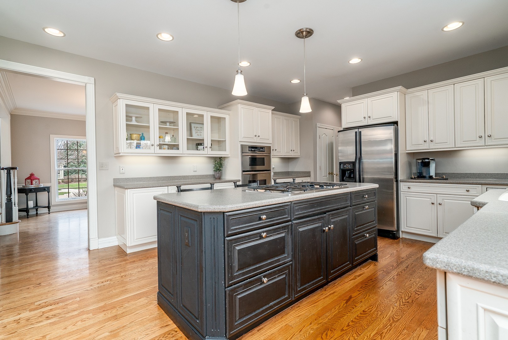 Undisclosed Address Geneva, IL 60134 - Photo 8 of 29 a kitchen with stainless steel appliances granite countertop a stove and a sink