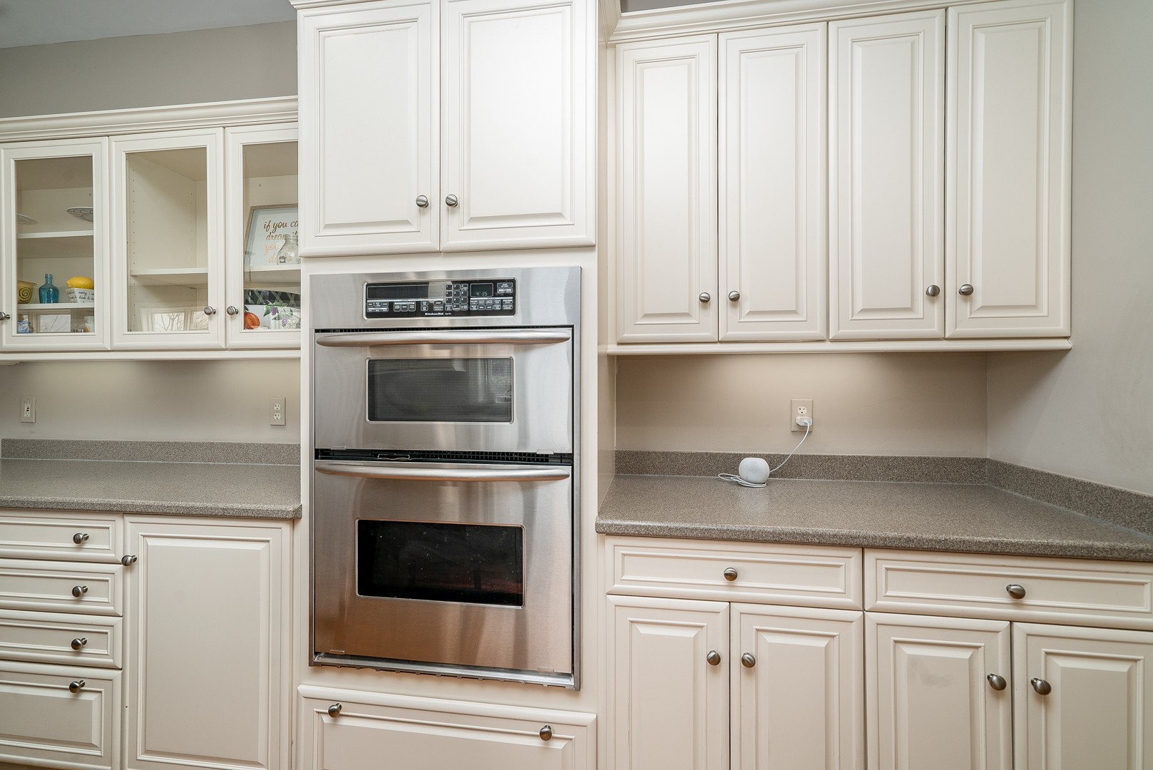 Undisclosed Address Geneva, IL 60134 - Photo 10 of 29 a kitchen with granite countertop white cabinets and stainless steel appliances