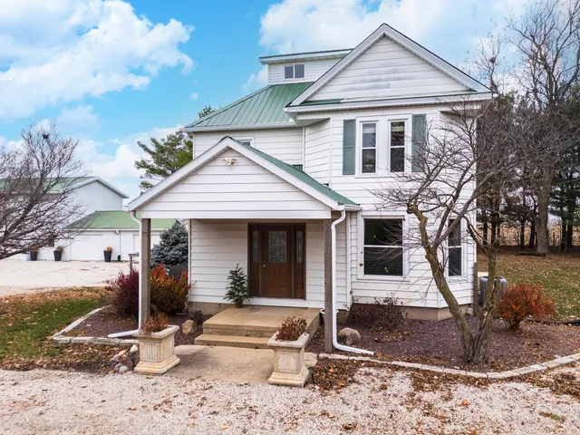 front view of a house with a yard