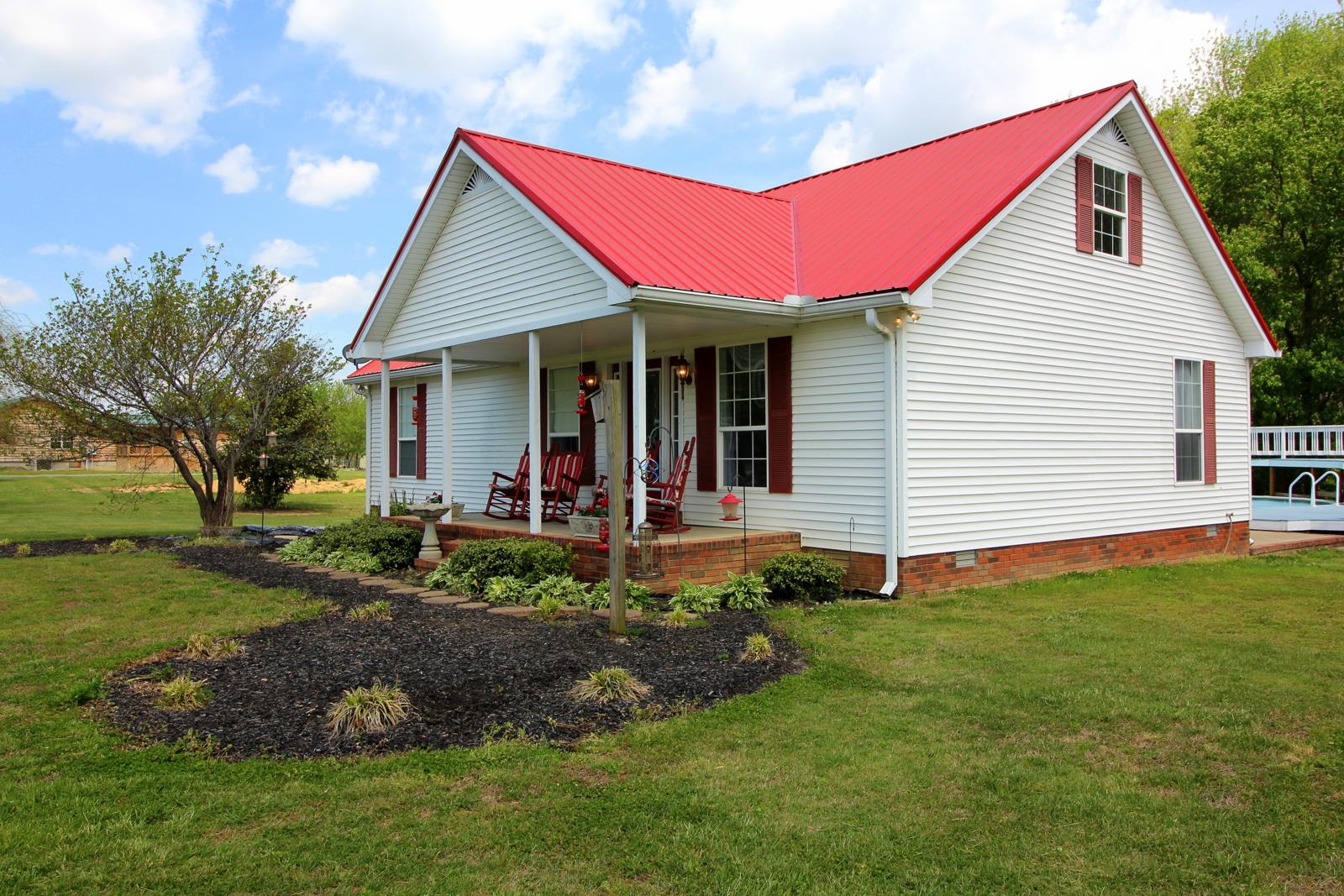 816 R B Highway Red Boiling Springs, TN 37150 - Photo 2 of 30 a view of a house with a backyard
