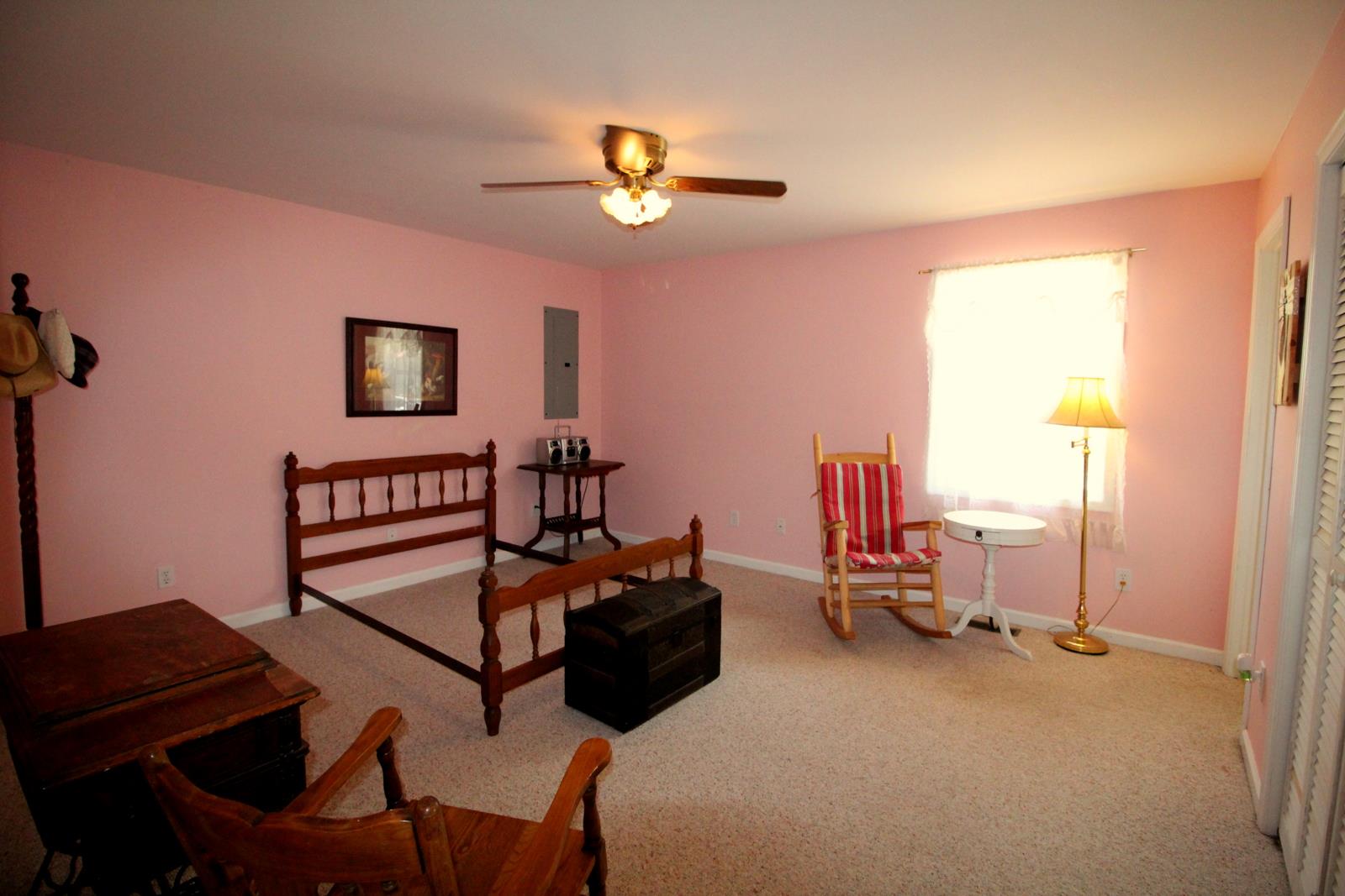 816 R B Highway Red Boiling Springs, TN 37150 - Photo 21 of 30 a living room with furniture and a flat screen tv
