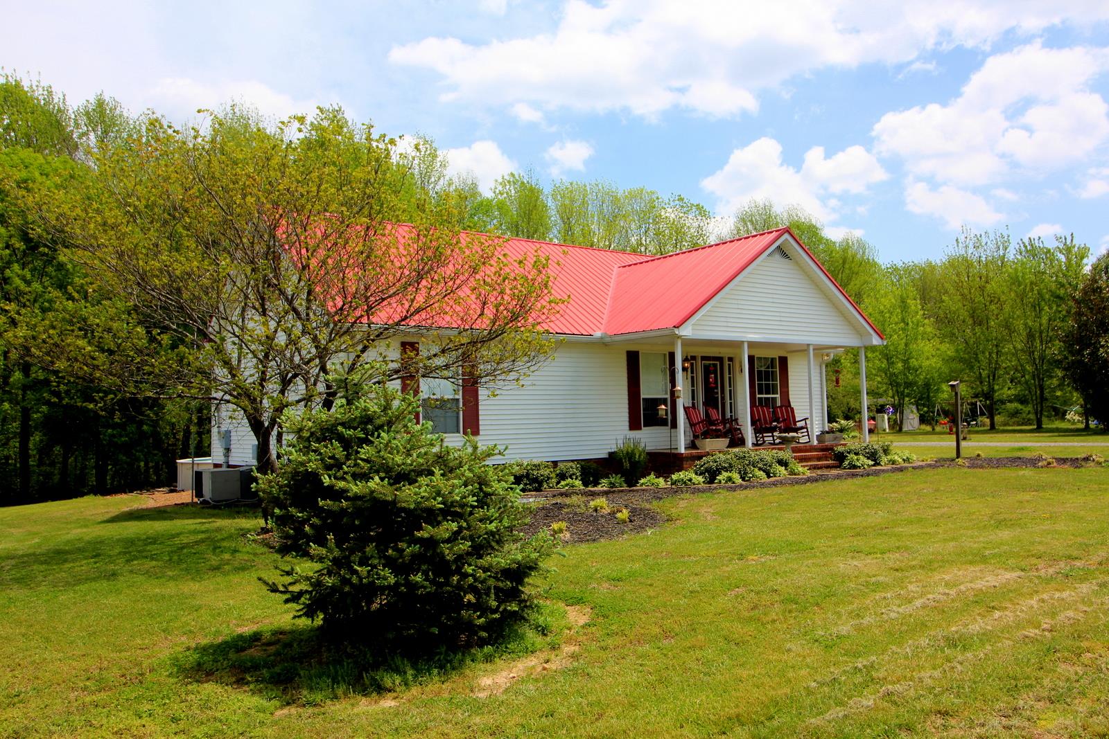 816 R B Highway Red Boiling Springs, TN 37150 - Photo 30 of 30 a front view of house with yard and trees