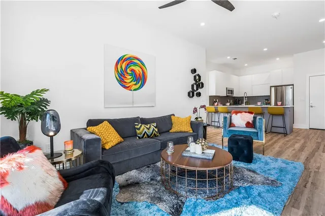 a living room with furniture and a table