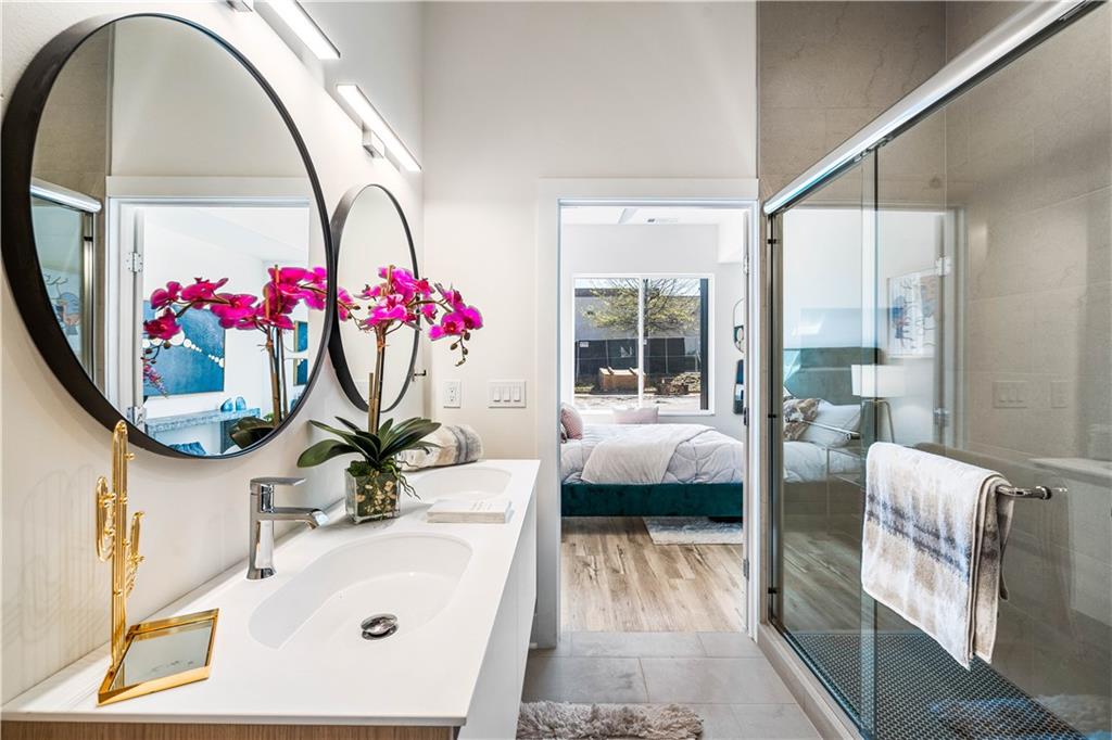 1155 Custer Avenue Southeast, Unit 202 Atlanta, GA 30316 - Photo 9 of 13 a living room with furniture and flowers