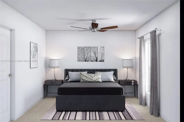 a bedroom with a bed and a painting on the wall