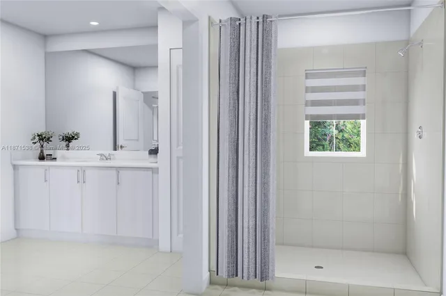 a bathroom with a sink a mirror and a shower