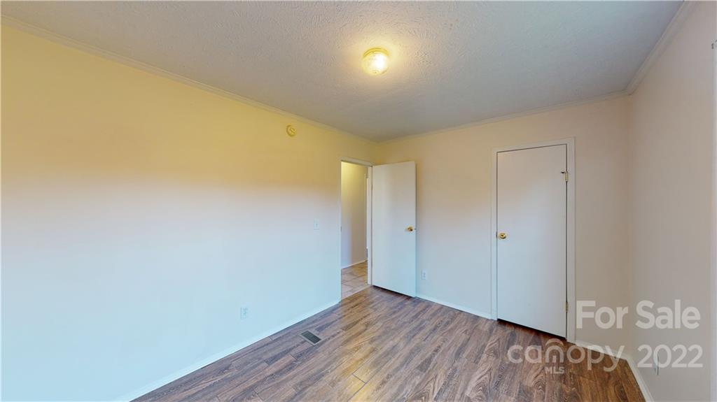 3180 Range Road Lincolnton, NC 28092 - Photo 16 of 29 a view of hallway with wooden floor