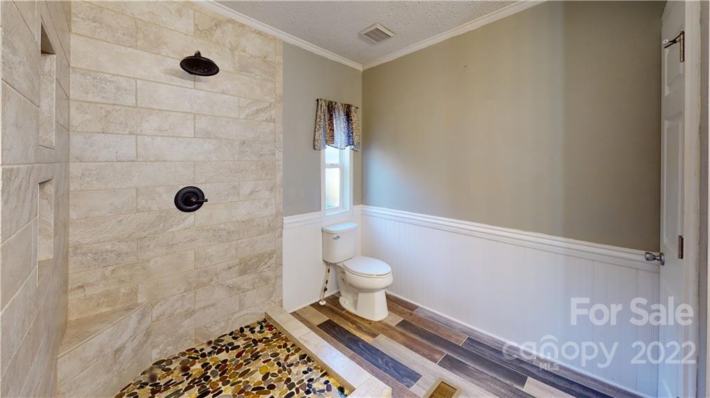 3180 Range Road Lincolnton, NC 28092 - Photo 21 of 29 a bathroom with a shower