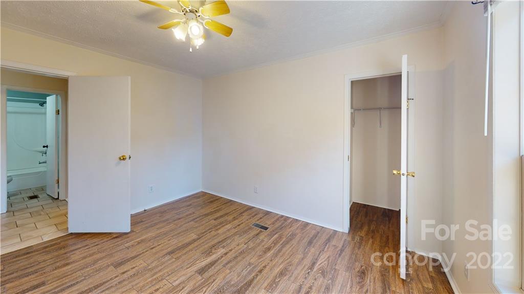 3180 Range Road Lincolnton, NC 28092 - Photo 26 of 29 wooden floor in an empty room with a window