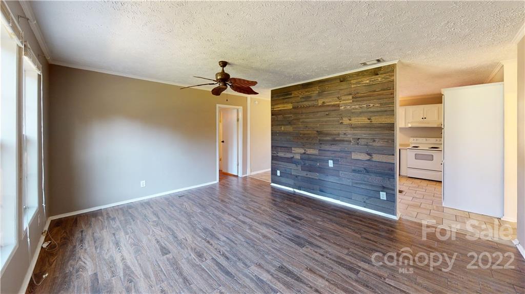 3180 Range Road Lincolnton, NC 28092 - Photo 29 of 29 wooden floor in an empty room with a window