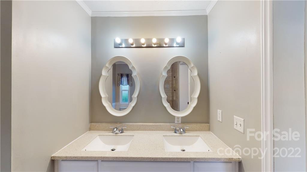 3180 Range Road Lincolnton, NC 28092 - Photo 8 of 29 a bathroom with a sink and a mirror