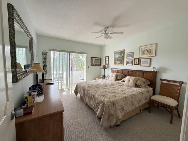 a view of a bedroom from a hallway