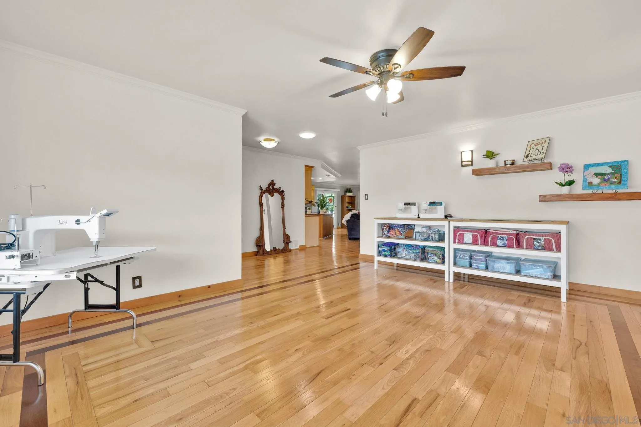 1695 Calmin Way Fallbrook, CA 92028 - Photo 12 of 44 a view of a workspace with furniture and wooden floor