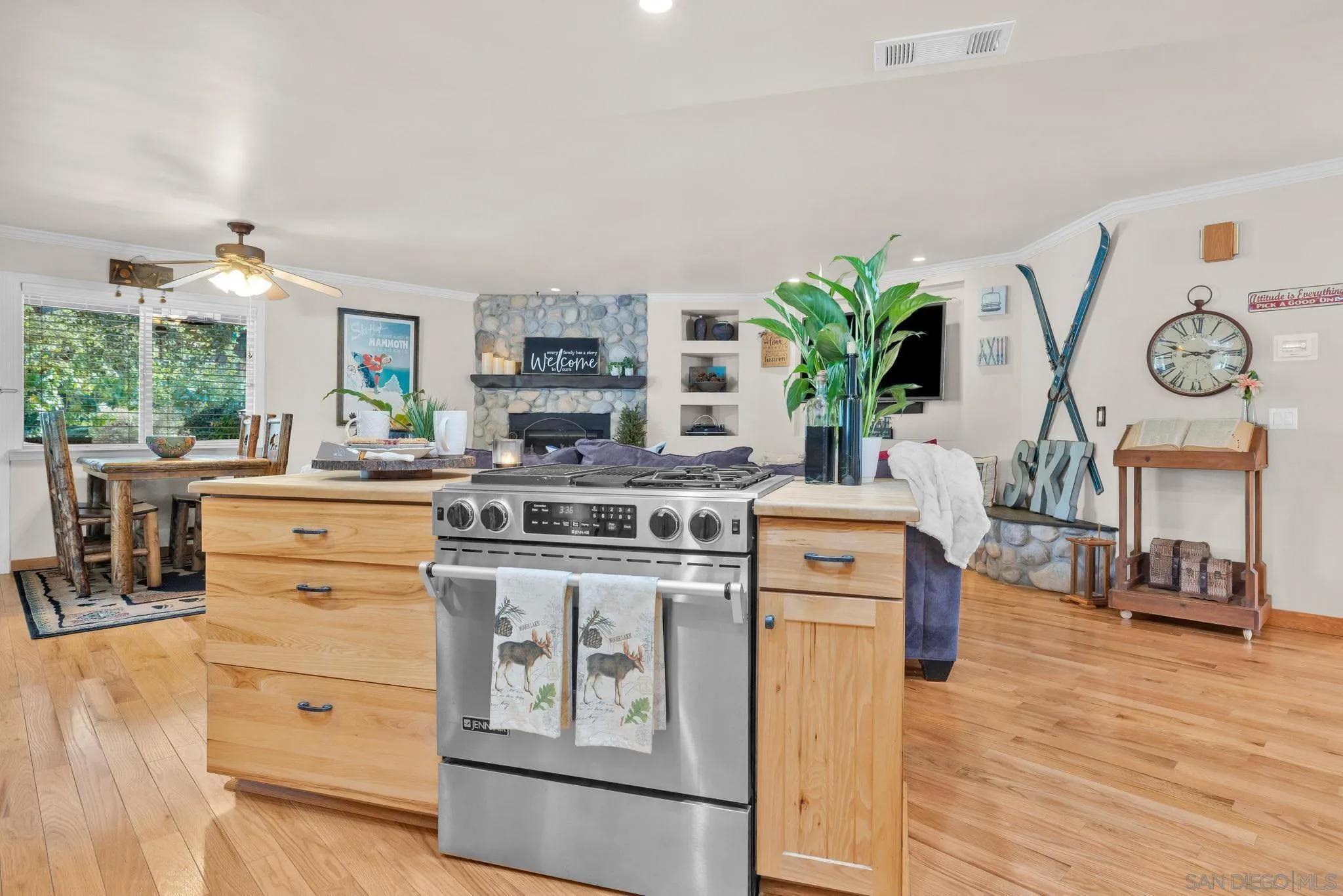1695 Calmin Way Fallbrook, CA 92028 - Photo 18 of 44 a kitchen with a stove a sink and a refrigerator
