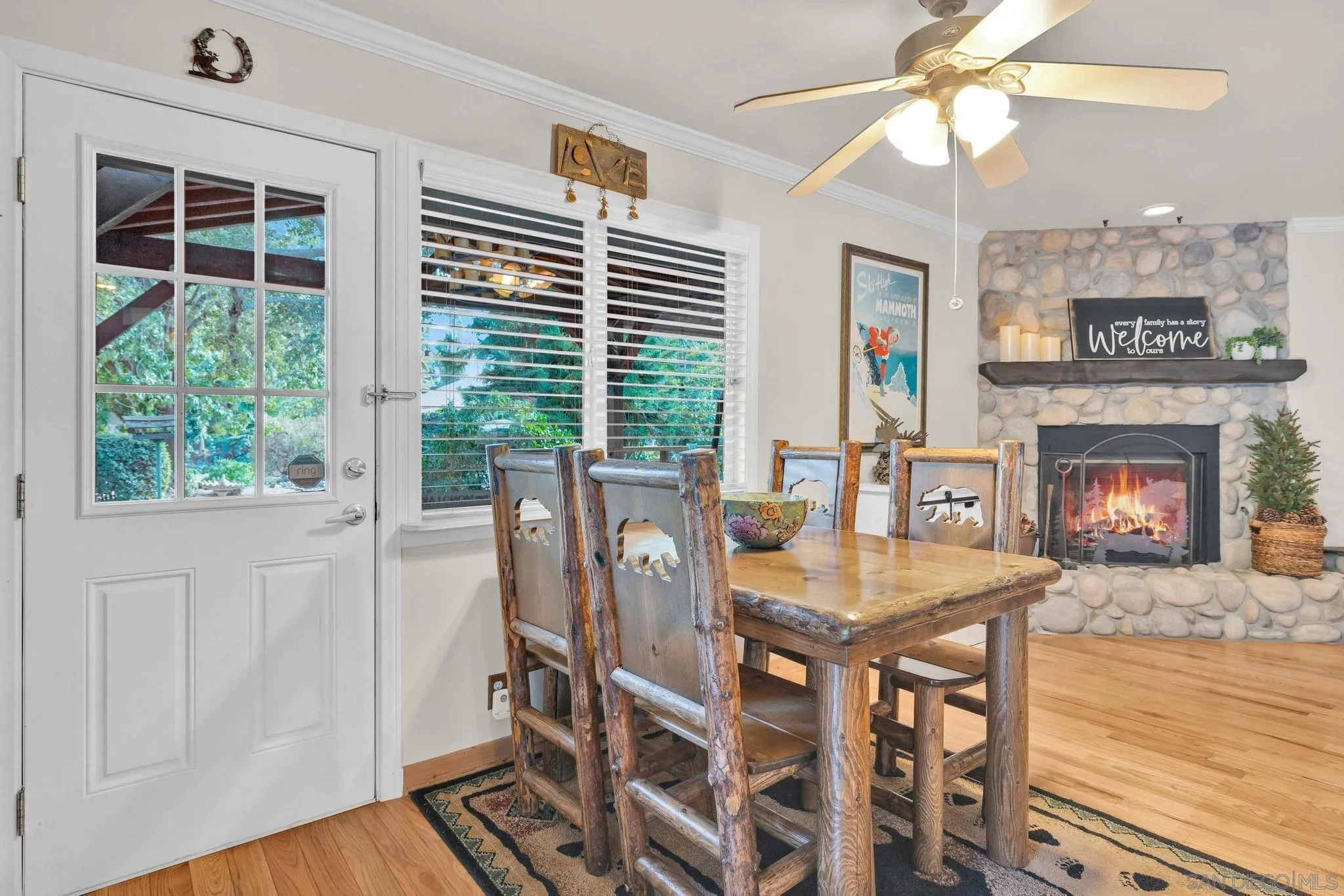 1695 Calmin Way Fallbrook, CA 92028 - Photo 20 of 44 a view of a dining room with furniture window and wooden floor