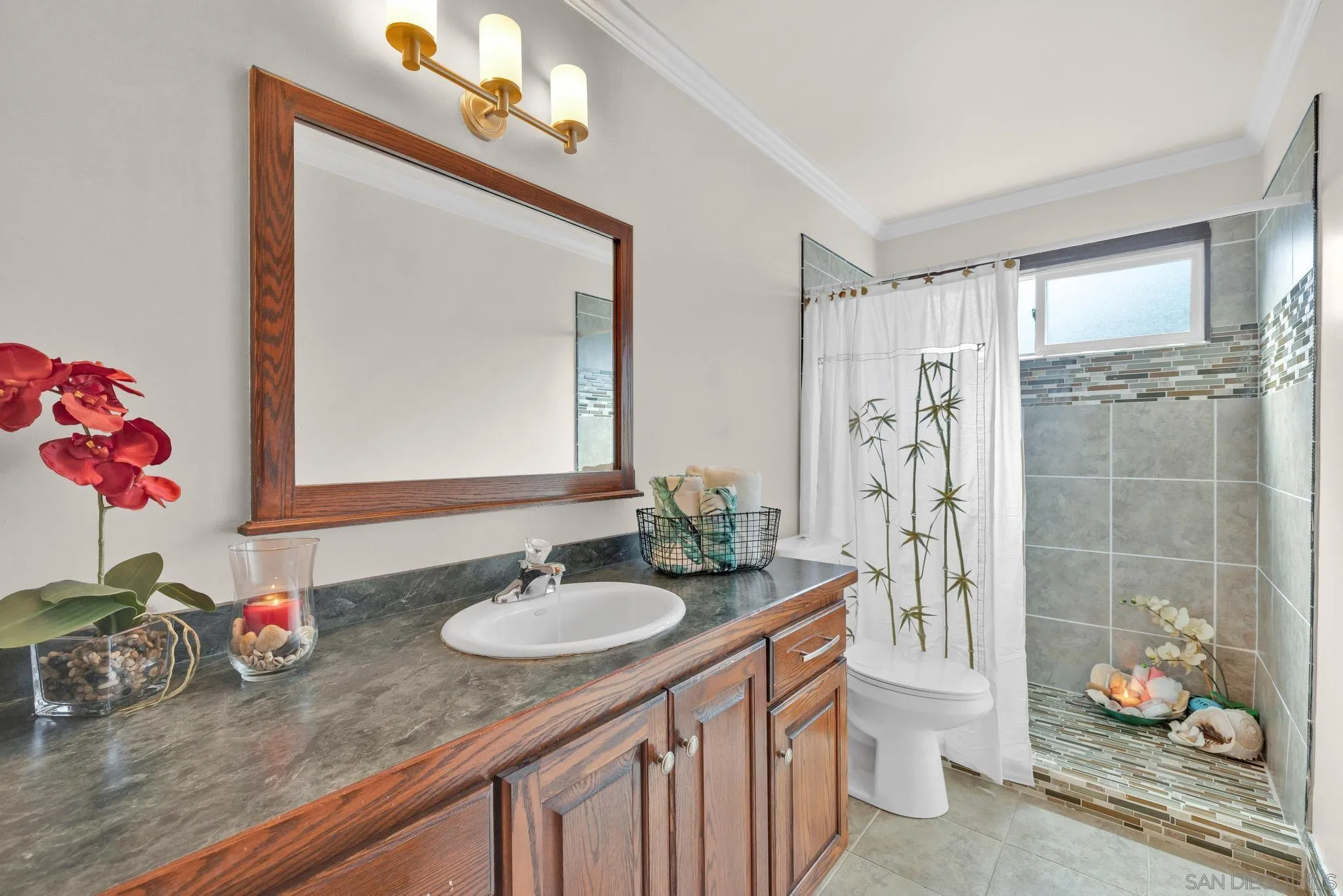 1695 Calmin Way Fallbrook, CA 92028 - Photo 24 of 44 a bathroom with a sink vanity granite and a toilet