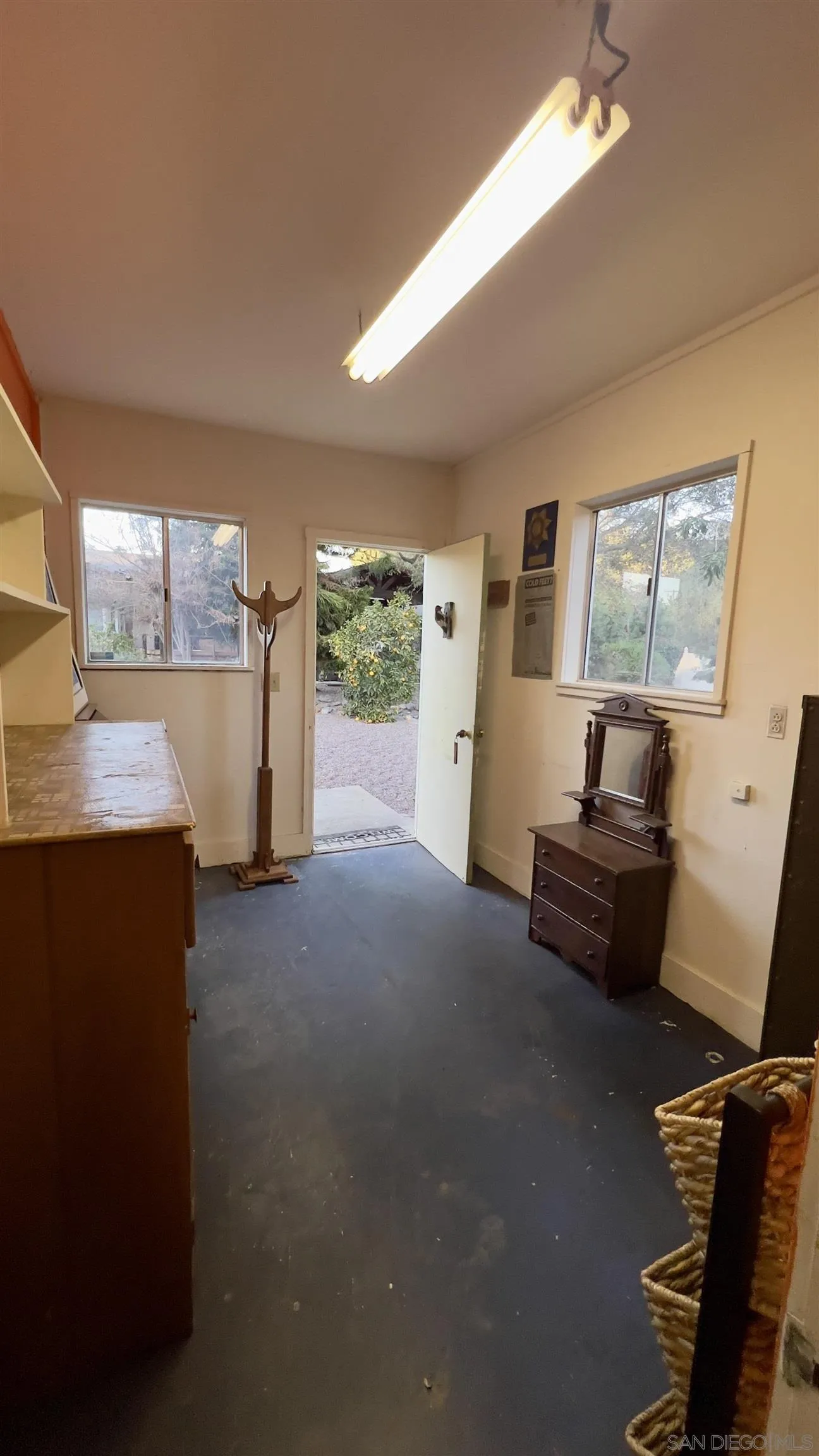 1695 Calmin Way Fallbrook, CA 92028 - Photo 41 of 44 a living room with furniture and a flat screen tv