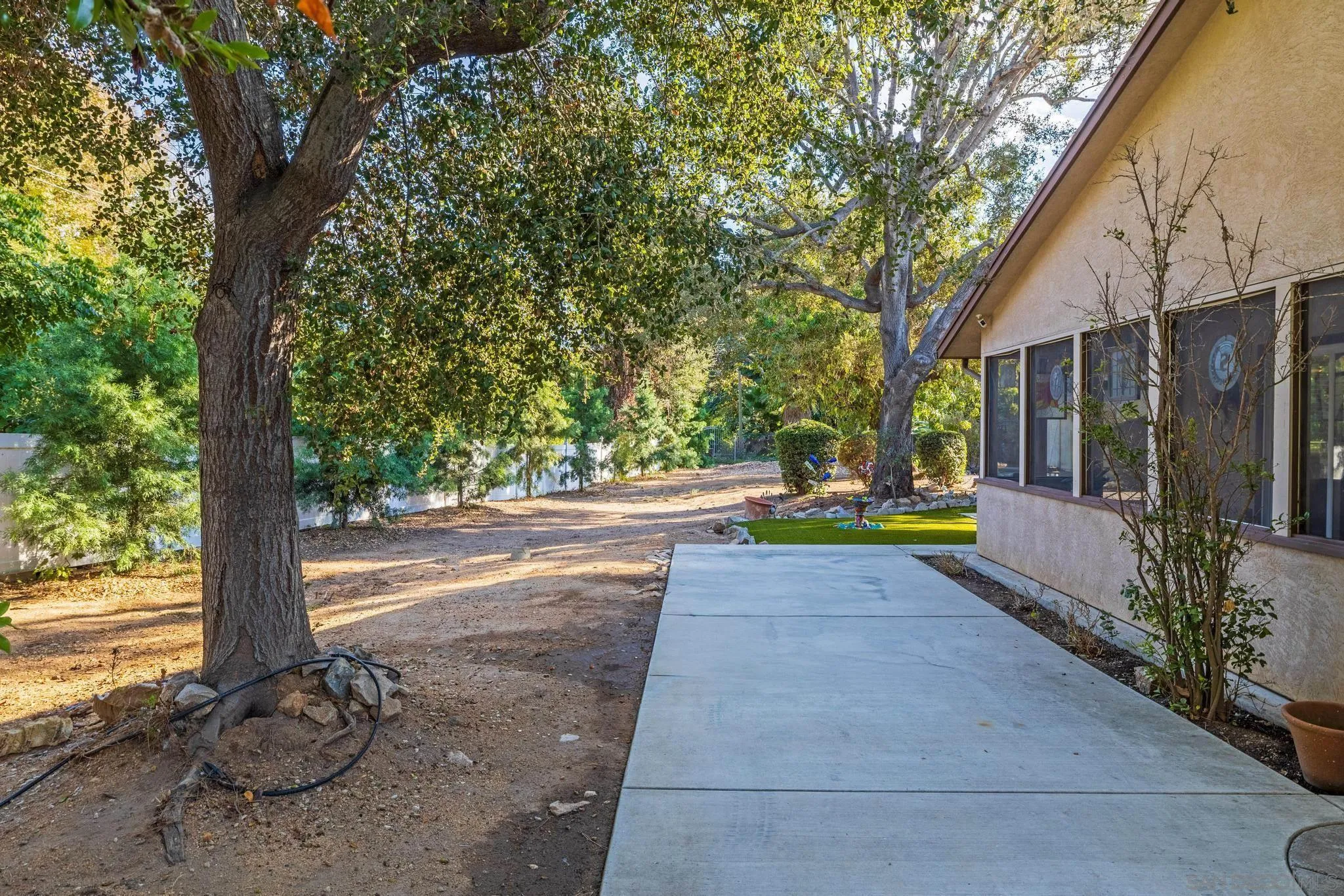 1695 Calmin Way Fallbrook, CA 92028 - Photo 5 of 44 a view of yard with tree in front of it