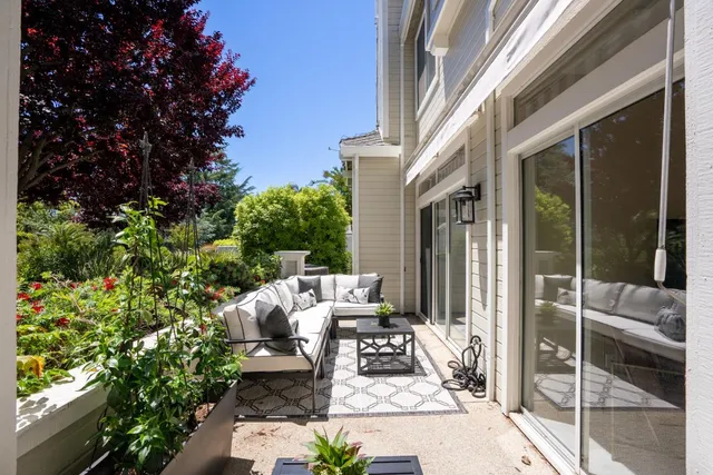 a view of a potted plants in front of a house