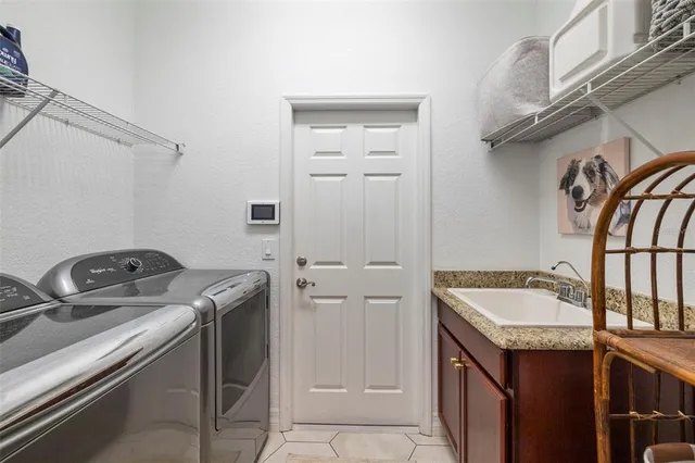 a bathroom with a tub and shower