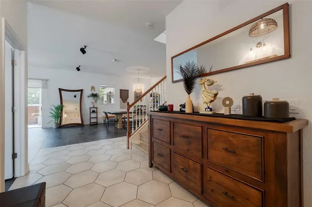 a living room with furniture and a table