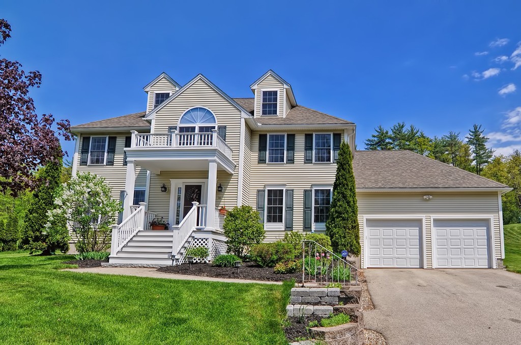 36 Proctor Road Townsend, MA 01469 - Photo 1 of 29 a front view of a house with a yard