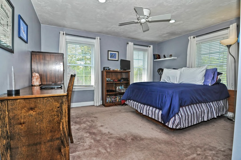 36 Proctor Road Townsend, MA 01469 - Photo 23 of 29 a bedroom with a bed and dresser with window