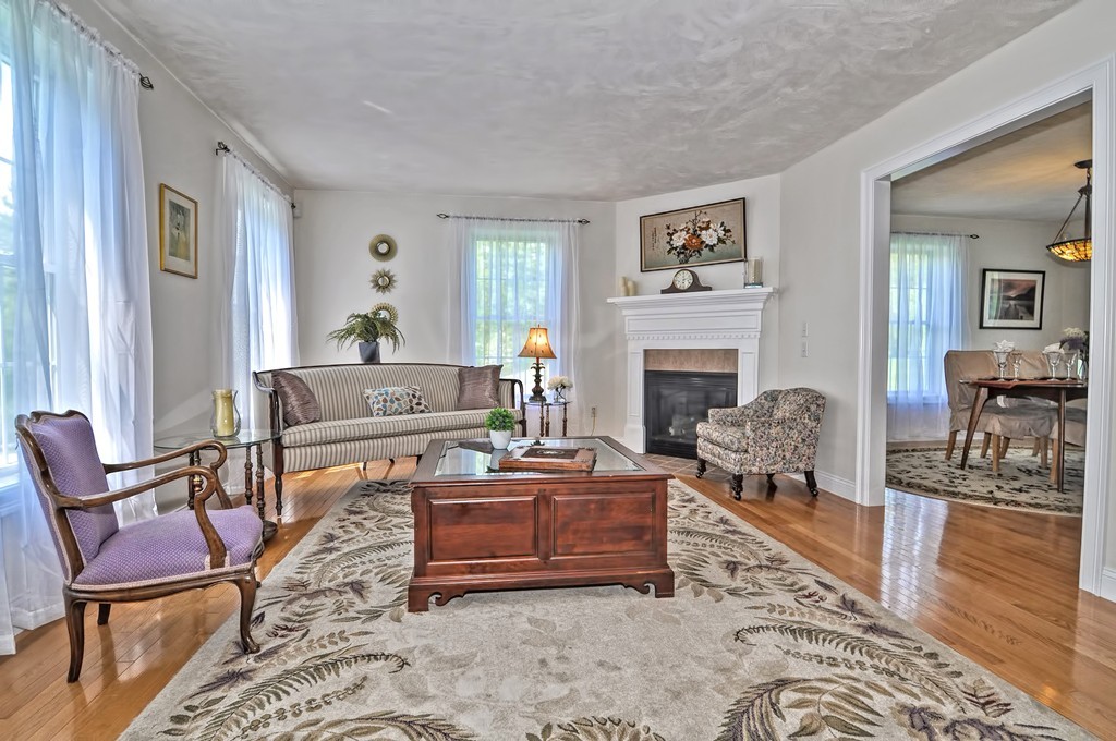 36 Proctor Road Townsend, MA 01469 - Photo 6 of 29 a living room with furniture and a fireplace