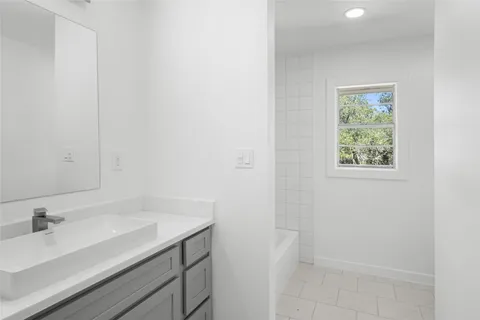 a bathroom with a bathtub