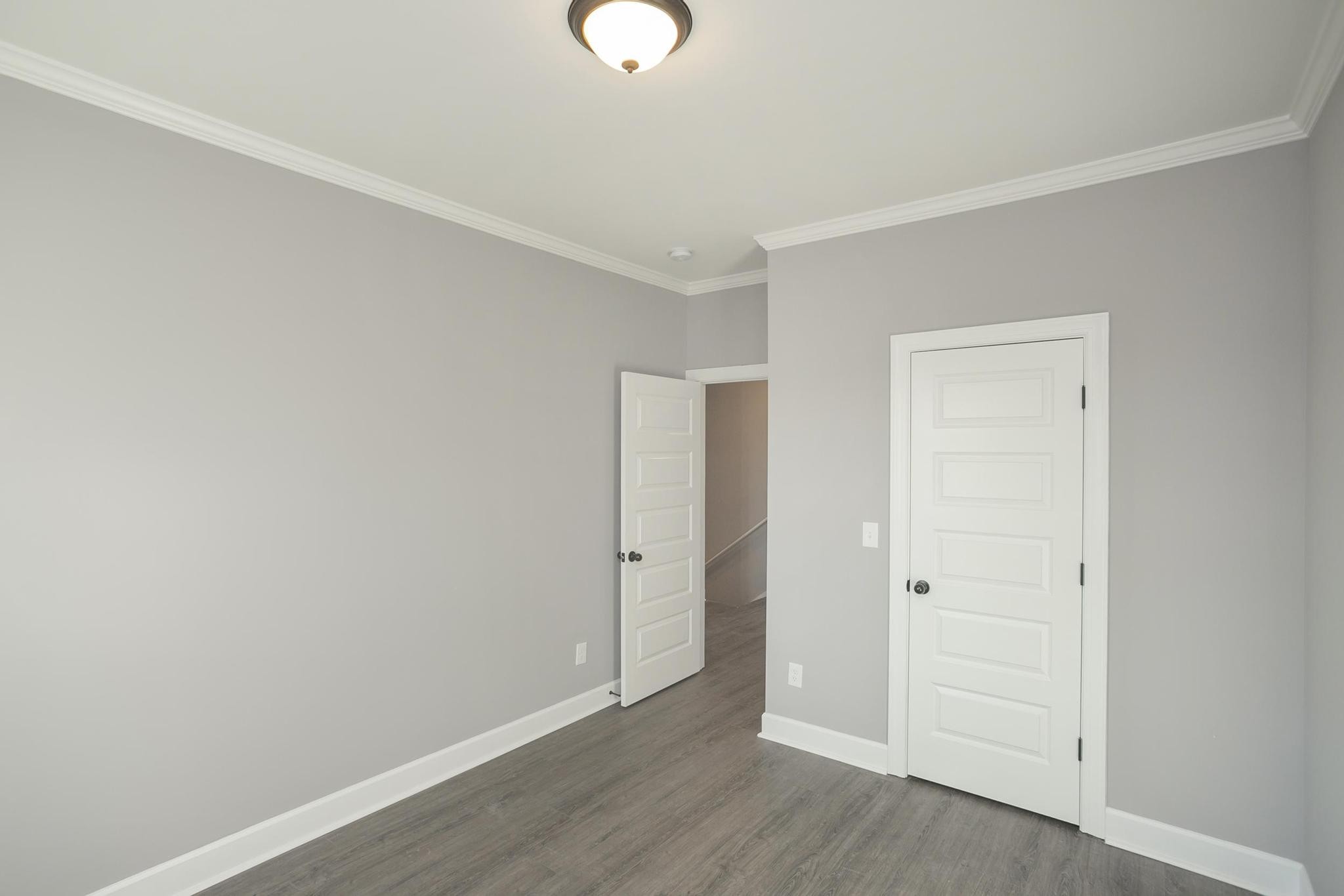 4329 Old Goins Road Nashville, TN 37211 - Photo 20 of 24 an empty room with wooden floor and closet