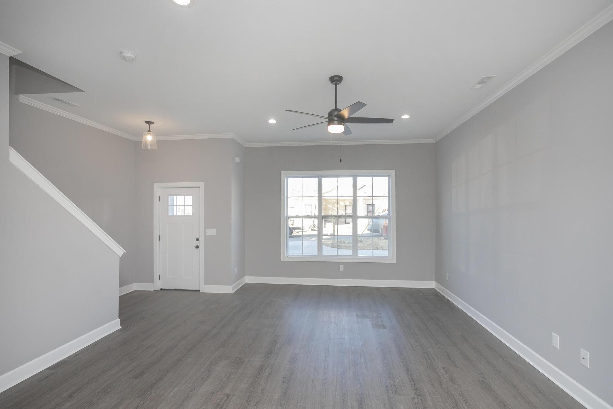 4329 Old Goins Road Nashville, TN 37211 - Photo 8 of 24 a view of an empty room with wooden floor and a window
