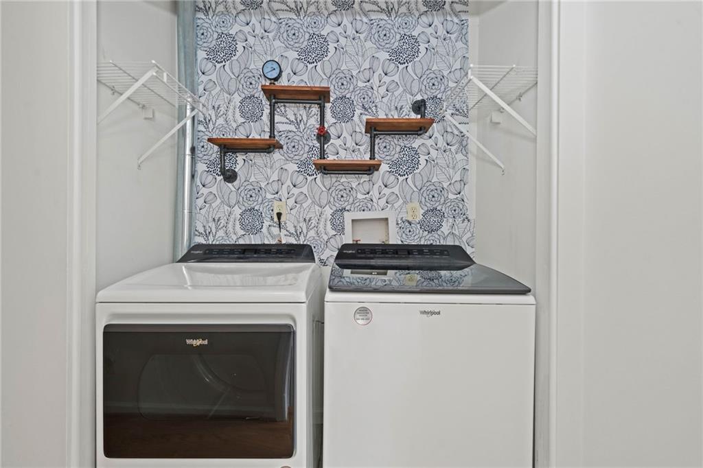 1468 Briarwood Road Northeast, Unit 108 Atlanta, GA 30319 - Photo 11 of 33 a view of washer and dryer