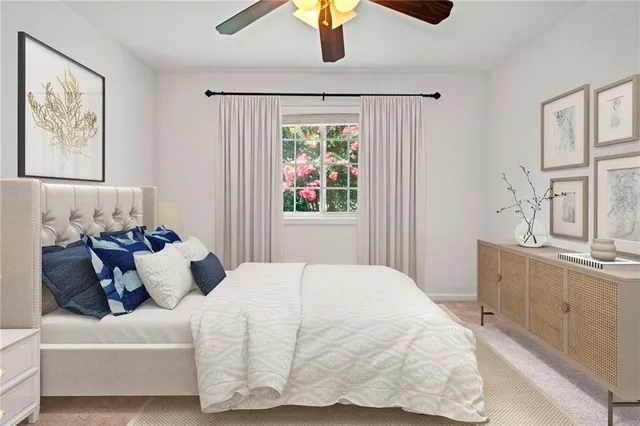 a bedroom with bed and window