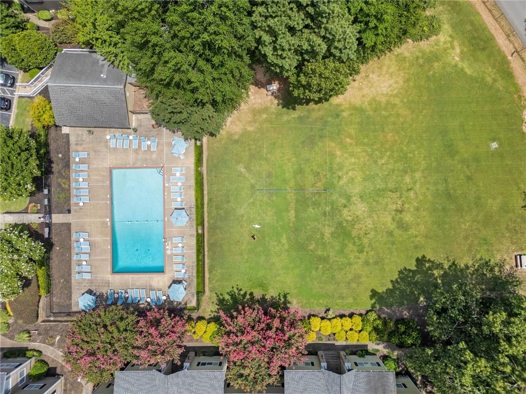 1468 Briarwood Road Northeast, Unit 108 Atlanta, GA 30319 - Photo 29 of 33 a front view of a house with a yard