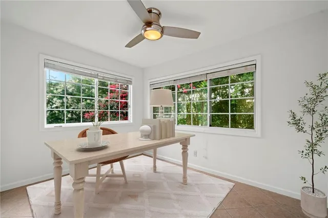 a workspace with furniture and a window