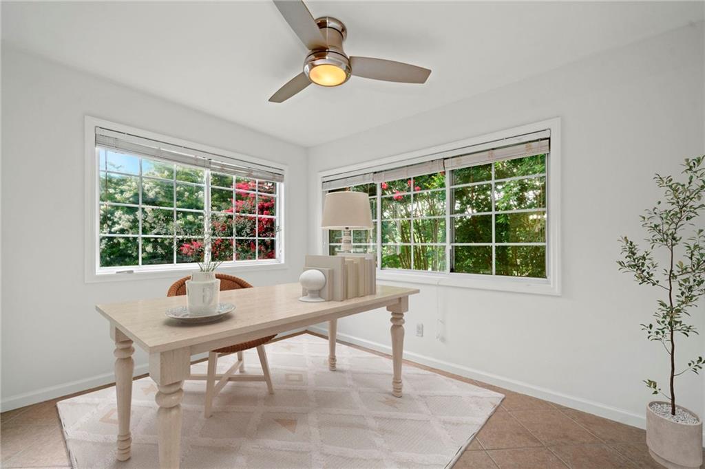 1468 Briarwood Road Northeast, Unit 108 Atlanta, GA 30319 - Photo 5 of 33 a workspace with furniture and a window