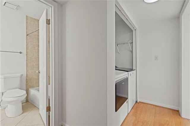 a bathroom with a toilet and a sink