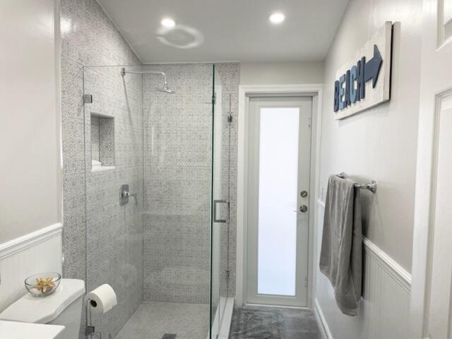 1801 South Us Highway, Unit 16D Jupiter, FL 33477 - Photo 15 of 28 a bathroom with a shower and a sink