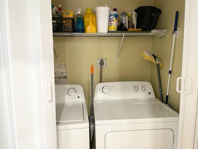 1801 South Us Highway, Unit 16D Jupiter, FL 33477 - Photo 16 of 28 a utility room with dryer and washer