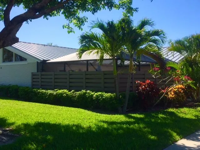 a view of a house with a garden