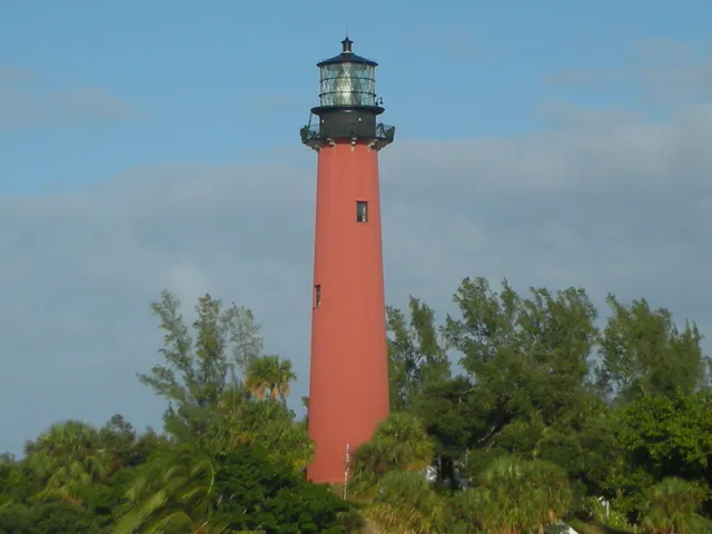 view of a building with a tree in front