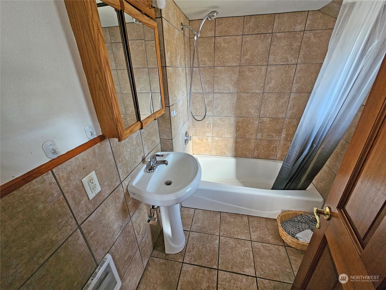 18220 Dallas Street Southwest Rochester, WA 98579 - Photo 12 of 28 a view of bathroom with a sink and mirror